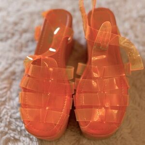 Trendy Orange jelly platform sandals.